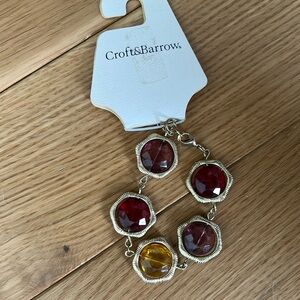 Red, mauve and gold glass bead bracelet